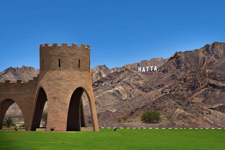 Explore the stunning landscapes of Hatta where historical architecture meets majestic mountains. Enjoy a day immersed in culture and nature perfect for those seeking a serene getaway.
